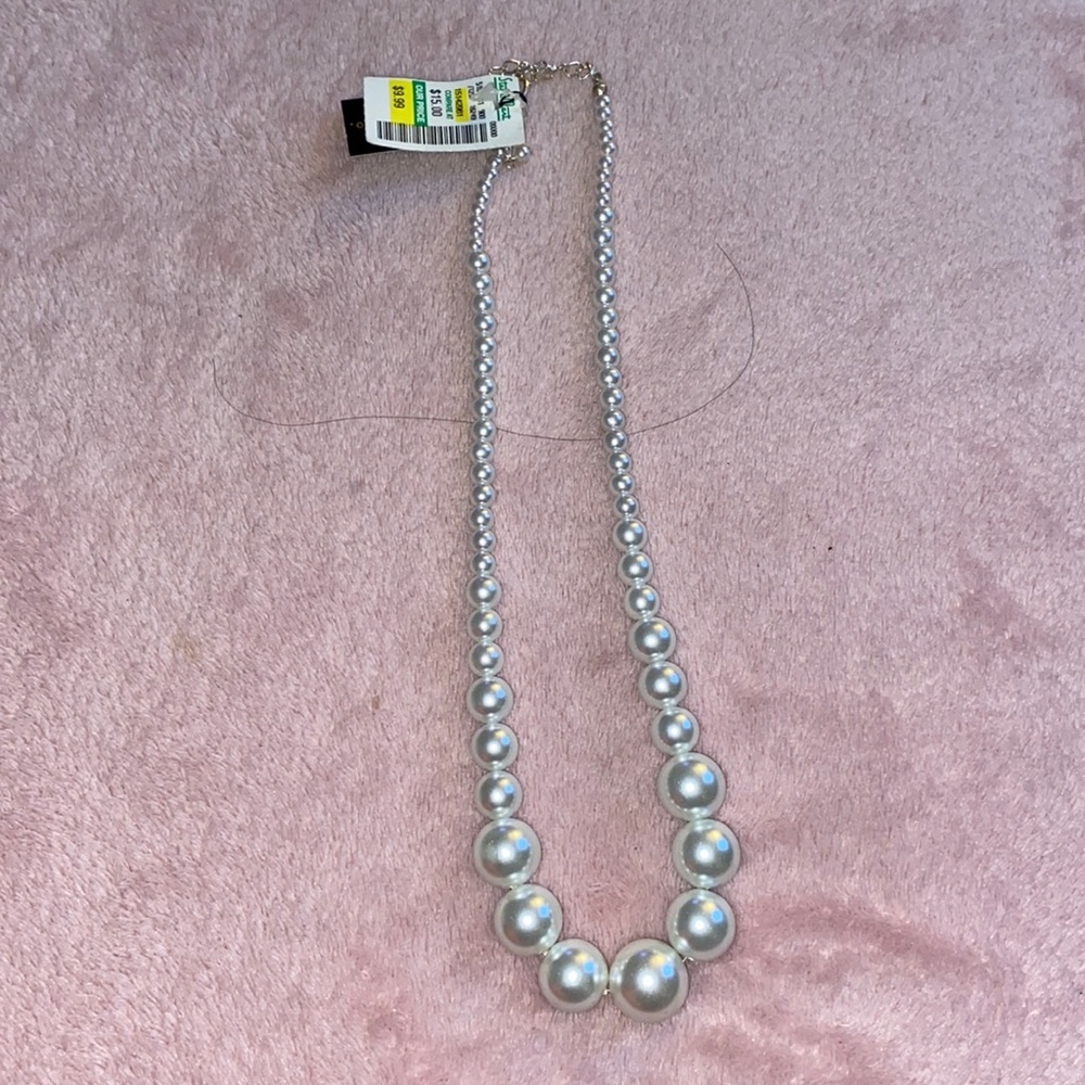 Faux pearls in graded sizes